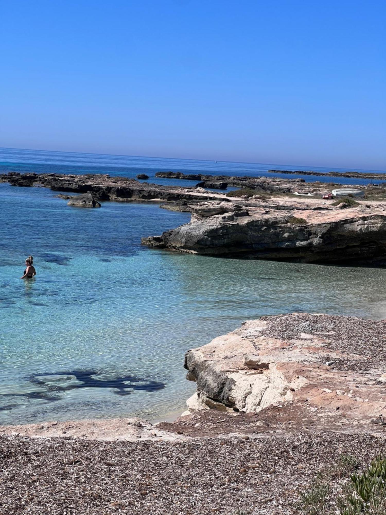Isola Serena Villa Фавиняна Екстериор снимка